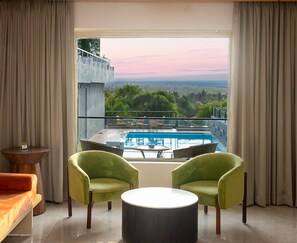 The Grand Superior Pool View Room | Minibar, in-room safe, desk, blackout drapes - Grand Continent Morjim (Morjim)