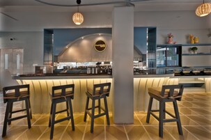 Breakfast, lunch, dinner served; local and international cuisine