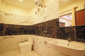 Family Room | Bathroom | Shower, rainfall showerhead, free toiletries, slippers - New Annapurna Plaza (Kanthi)