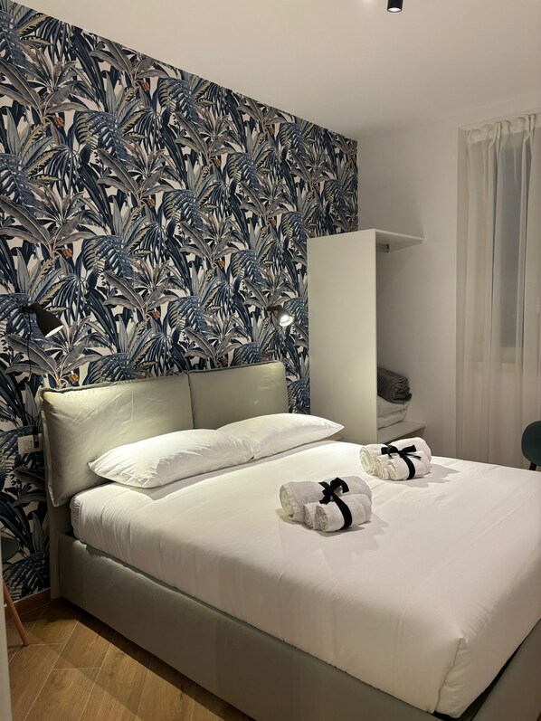 1 bedroom, desk, iron/ironing board, travel cot