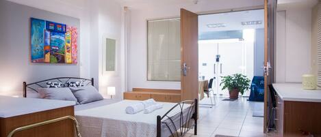 1 غرفة نوم ومكواة/لوح كي وواي فاي وملاءات أسرّة