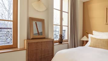 Family Triple Room | In-room safe, desk, laptop workspace, blackout drapes