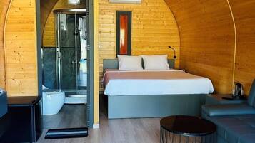 Bungalow, Pool View | Minibar, WiFi (free), bed sheets