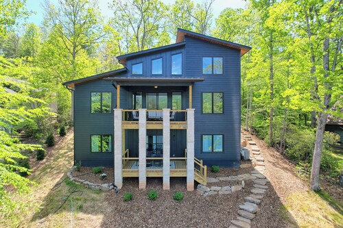 Windjammer  Lakehouse by Chatuge Home Concierge <br>lakefront, pool table, Fire pit, SUP, Kayaks, private dock with covered boat slip