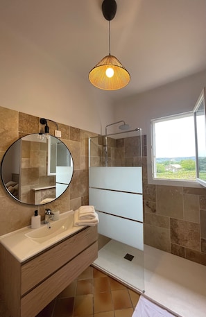 Shower, hair dryer, towels, soap