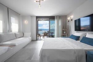 Royal Apartment | Living area | 40-inch Smart TV with cable channels