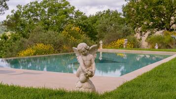 Outdoor pool, open 10:00 AM to 8:00 PM, sun loungers