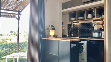 Fridge, microwave, stovetop, coffee/tea maker