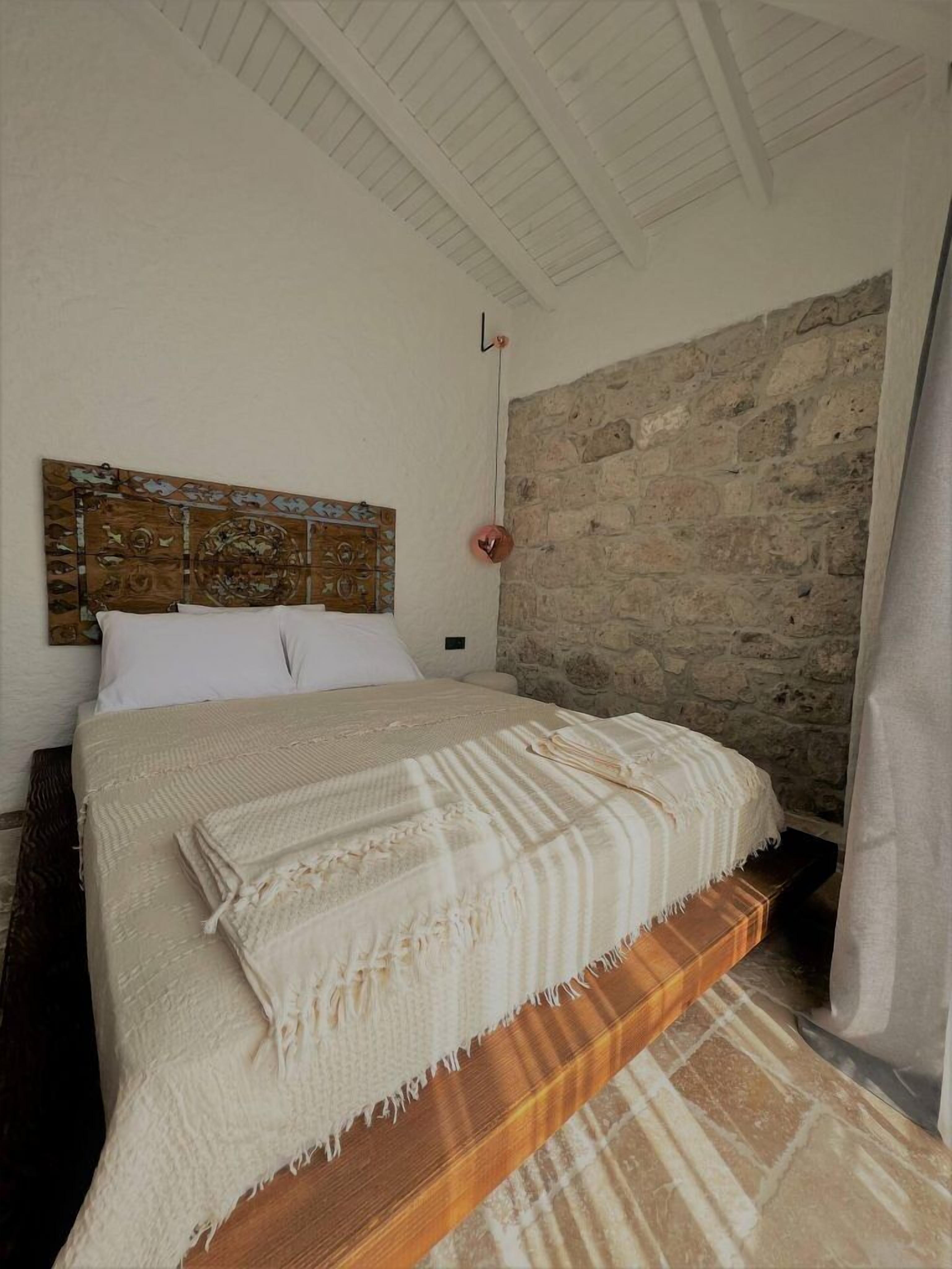 Luxe beddengoed, een kluis op de kamer, een strijkplank/strijkijzer