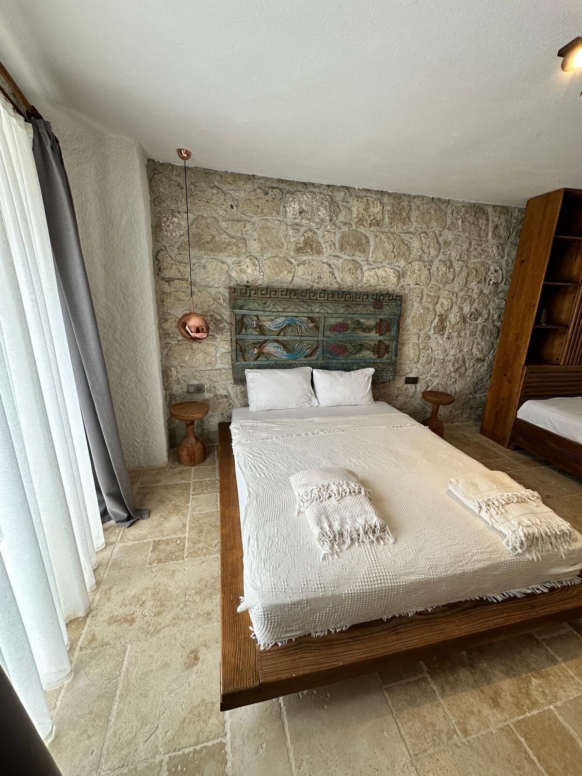 Luxe beddengoed, een kluis op de kamer, een strijkplank/strijkijzer