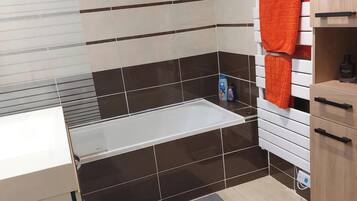 Hair dryer, towels, soap, shampoo