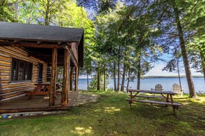Terrace/patio - Fisher Trail Cabin - On Burt Lake! Cozy Cabin! Quiet Setting! (Alanson)
