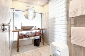 Shower, towels, soap, shampoo