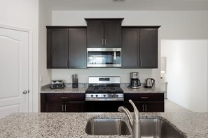 Fridge, microwave, oven, stovetop - Spacious 7BR Solterra Getaway w/ Pool & Spa (Davenport)