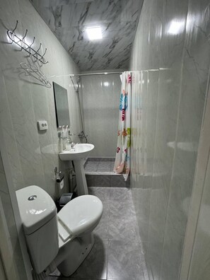 Basic Room | Bathroom | Slippers - Boulevard (Bukhara)