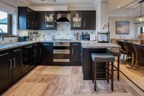 High chair, dining tables - Highfield - 5 Bedroom Holiday Home - Pembroke Dock (Pembroke Dock)