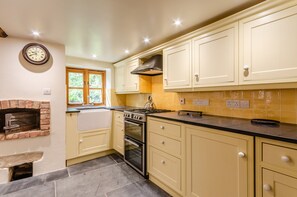 Fridge, oven, cookware/dishes/utensils