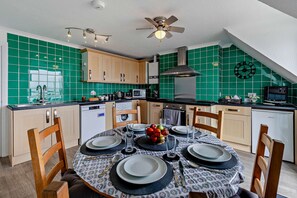 Fridge, oven, dishwasher, cookware/dishes/utensils