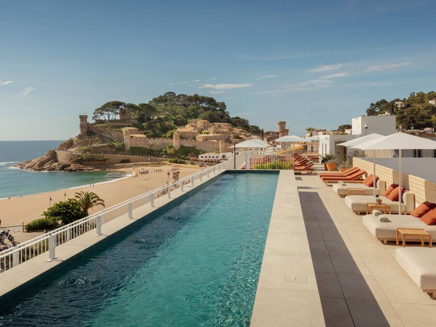 Outdoor pool, open 10:00 AM to 9:00 PM, pool umbrellas, sun loungers
