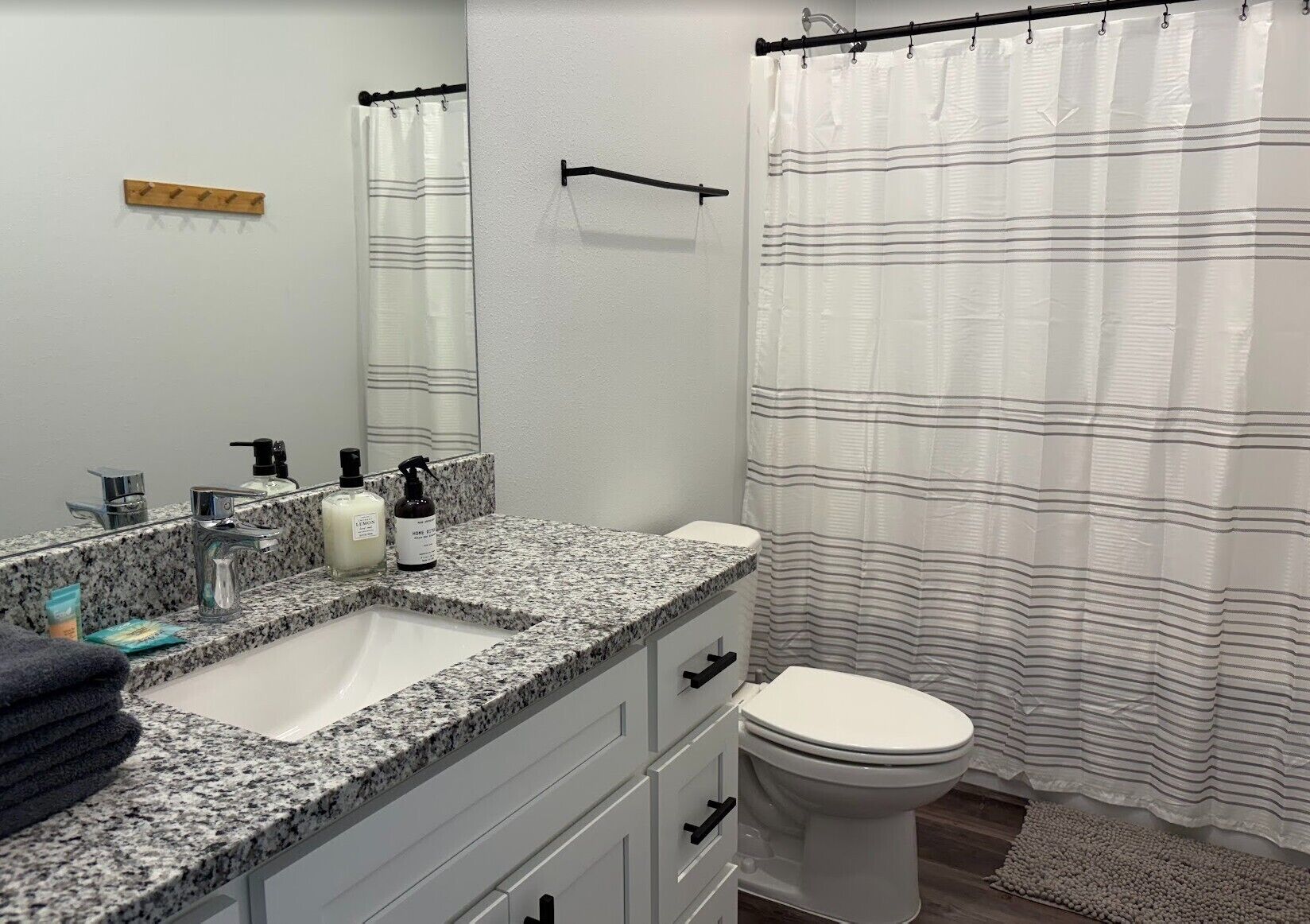 Shower, towels, soap, toilet paper