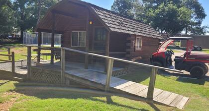Escape to Texarkana's Log Cabin with All the Comforts!