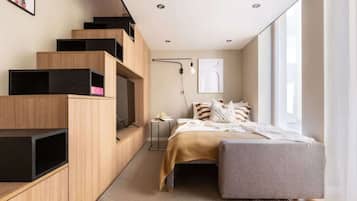 1 habitación, tabla de planchar con plancha, cuna de viaje y wifi