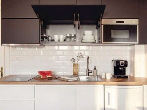 Fridge, microwave, stovetop, coffee/tea maker