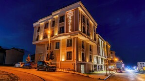 A multi-story hotel with a prominent sign reading "Airgate Hotel." - AirGate Airport Hotel (Arnavutköy)