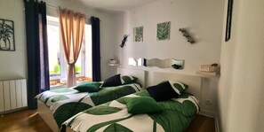 2 dormitorios, tabla de planchar con plancha, wifi gratis y ropa de cama