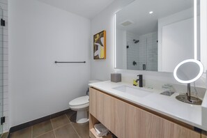 Luxury Condo, Balcony, City View | Bathroom | Shower, rainfall showerhead, hair dryer, towels