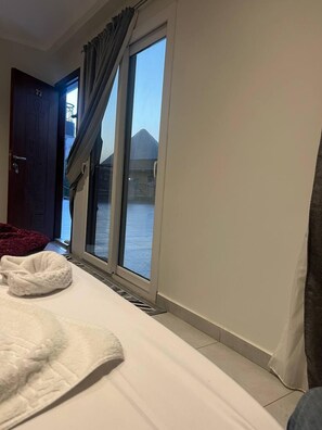 Deluxe Double or Twin Room, Balcony | Desk, free WiFi - Pyramids Heritage INN (Giza)