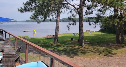 Rustic cabin getaway on the shore of Soo Lake in Phillips, WI