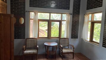 Quadrupla Deluxe, balcone | Area soggiorno