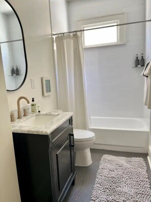 Hair dryer, towels, soap, shampoo