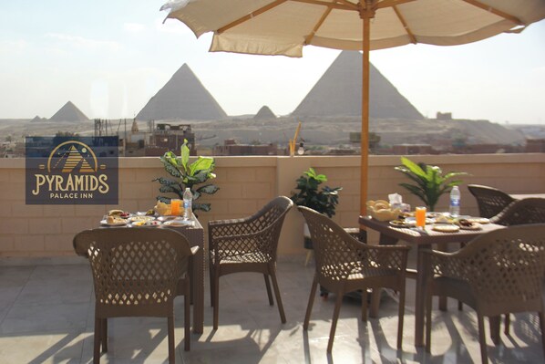 Outdoor dining - pyramids palace inn (Giza)