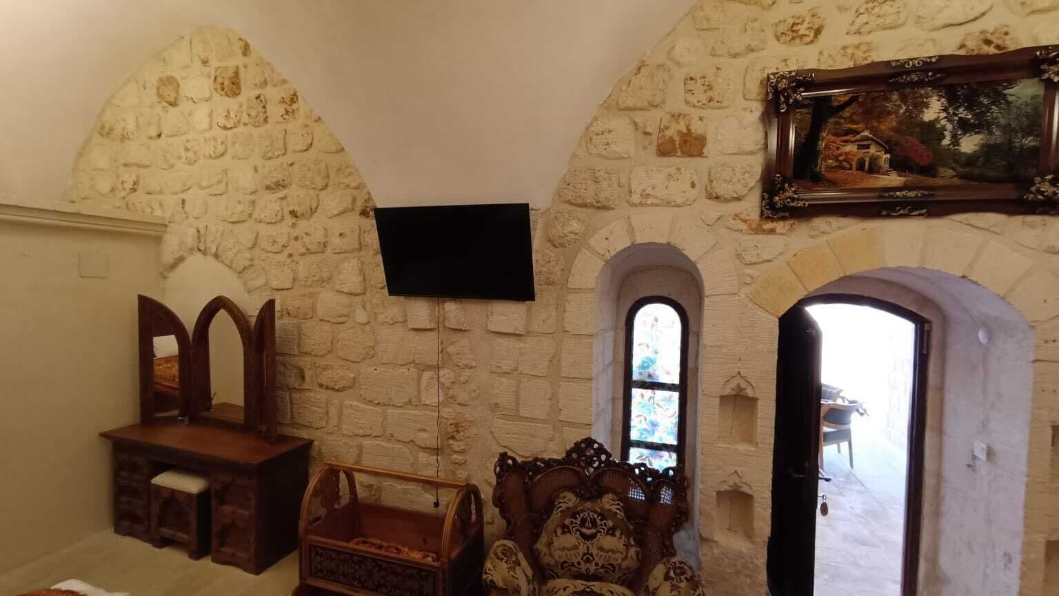 Family Triple Room, Garden View | In-room safe, individually decorated, desk, soundproofing