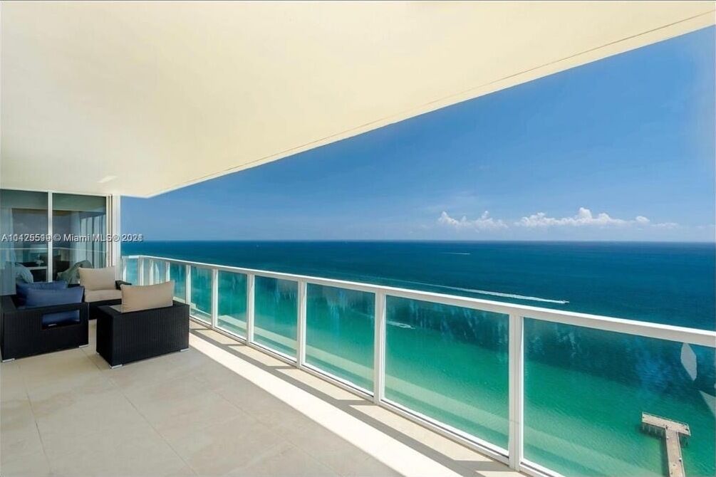 Luxury direct ocean and city view condo on the beach with wraparound balcony 