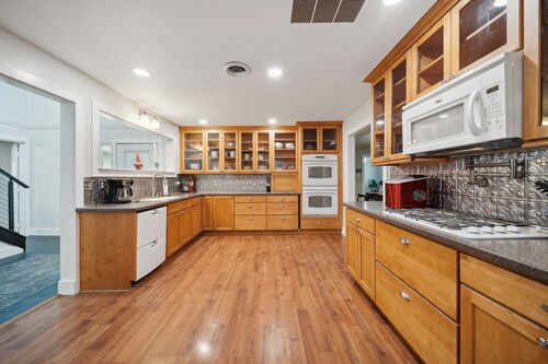 Stunning modern lakefront home, boat slip, pool table, huge deck & more!