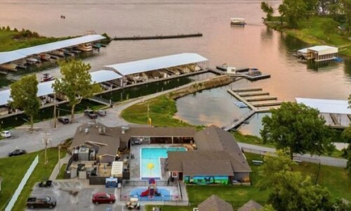 Stunning modern lakefront home, boat slip, pool table, huge deck & more!