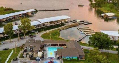 Stunning modern lakefront home, boat slip, pool table, huge deck & more!