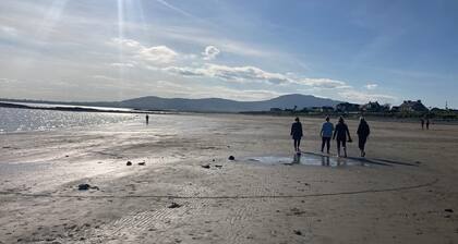 Country cottage in peaceful setting, nestled between the mountains and the sea.