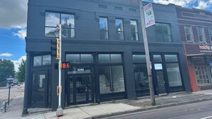 A building with a black facade, large windows, and a sign reading "C.L. ANDREWS 1909". - NEW!! Forever Young I Pettigrew Adventures in Midtown  (Memphis)