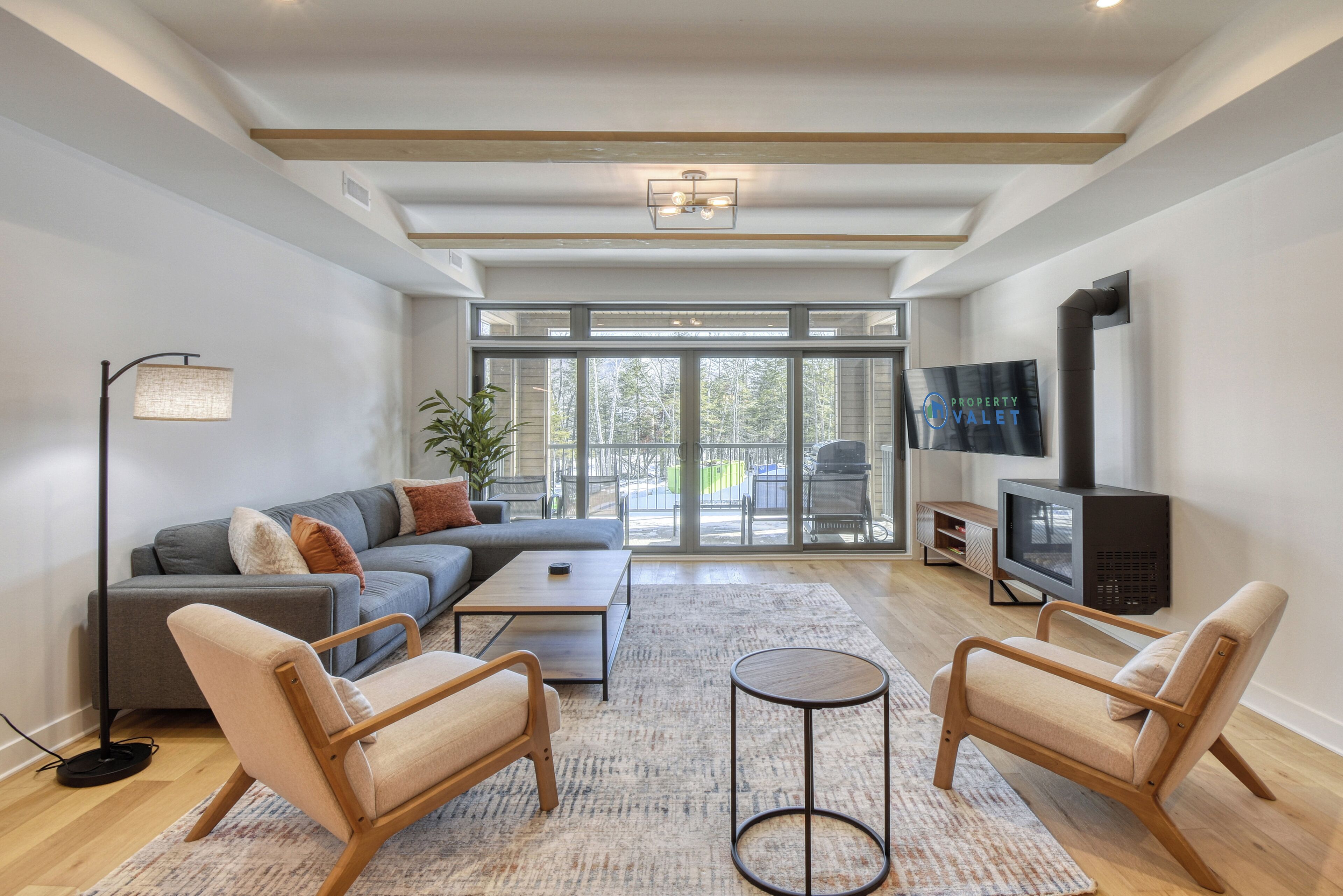 Premium Condo | Living area | 50-inch Smart TV with digital channels