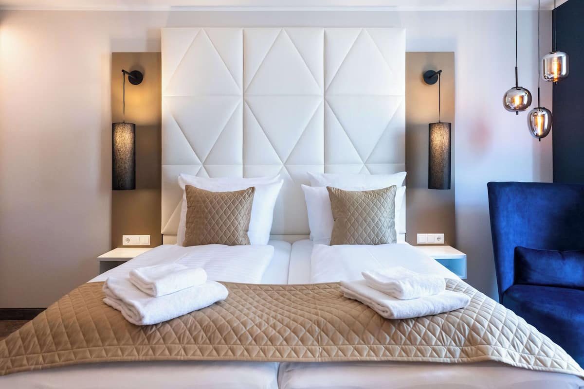 Egyptian cotton sheets, premium bedding, down duvets, memory-foam beds