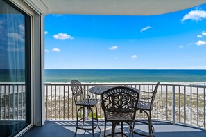 Outdoor dining - Spanish Key 506 | Oceanfront Condo | Steps from Flora Bama | Pools, Hot Tub, Gym & More! (Pensacola)