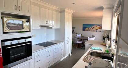 Freshly painted 4 bedroom home only a short drive into the heart of our CBD and our fabulous beache