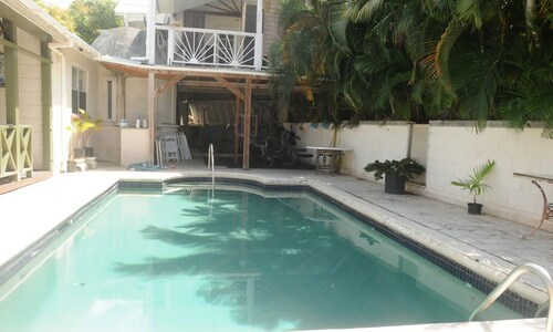 Cozy 2 bedroom  air conditioned 1 bathroom apartment with swimming pool .