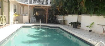 Cozy 2 bedroom air conditioned 1 bathroom apartment with swimming pool .