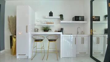 Mini-fridge, microwave, stovetop, espresso maker