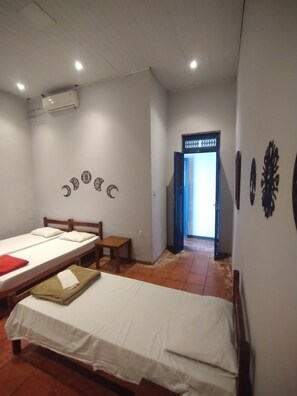 Triple Room (Suíte Cristais) | Blackout drapes, free WiFi - Pousada e Hostel Andarai (Andaraí)